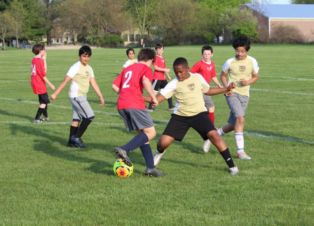 Youth boys playing soccer